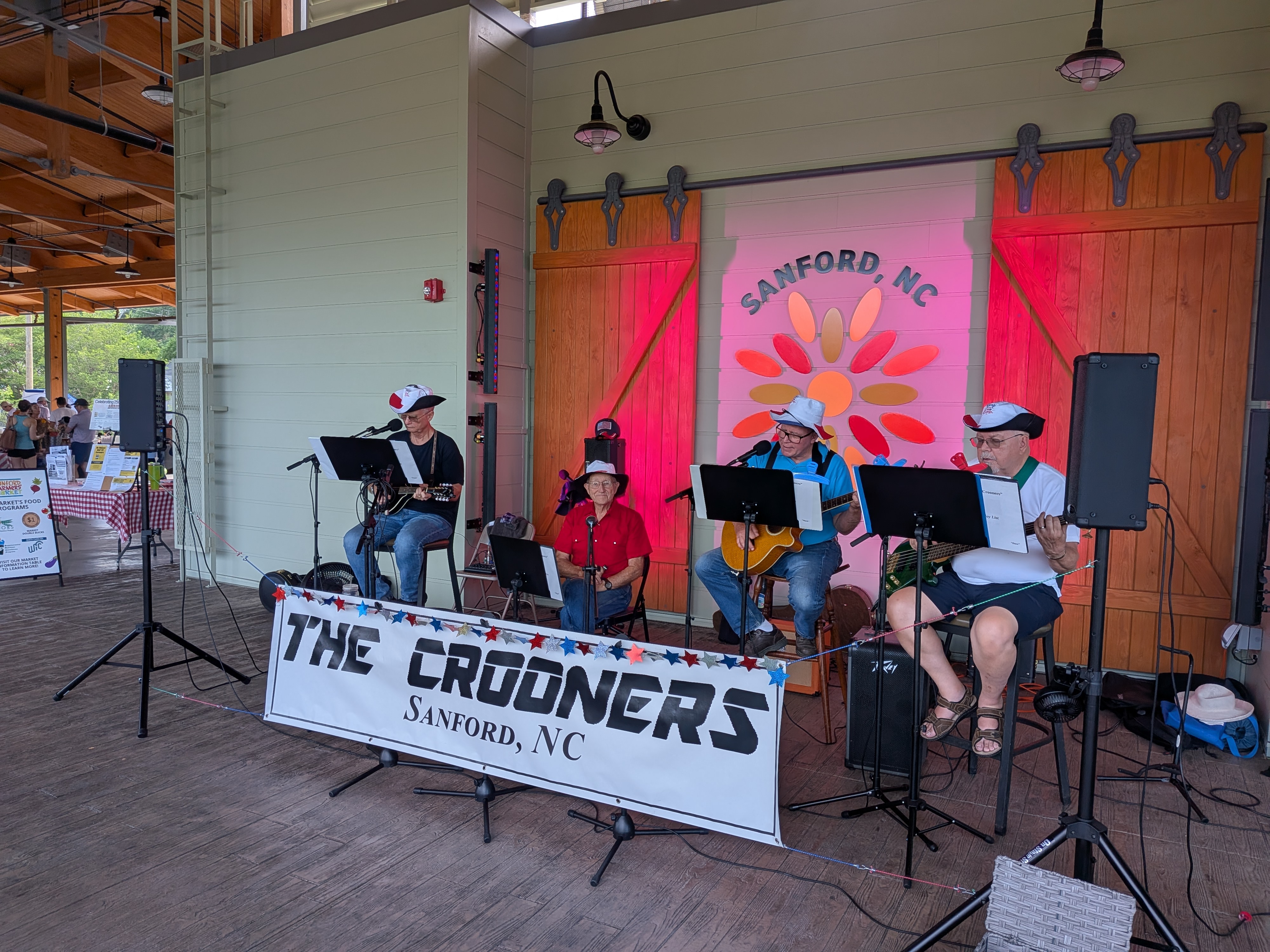 The Crooners performing live on the Sanford Farmers’ Market stage
