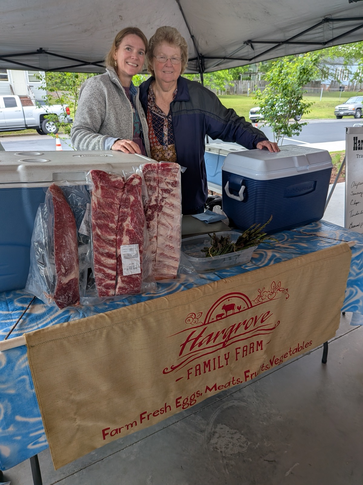 The Hargrove Family Farm vendors at their market stand